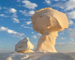 The visitors can also witness large white chalk rocks which are often created due to erosion by wind and sand The visitors can also witness large white chalk rocks which are often created due to erosion by wind and sand.